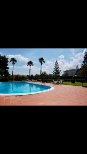 Villa Assunta - Elegante villino in residence con piscina
